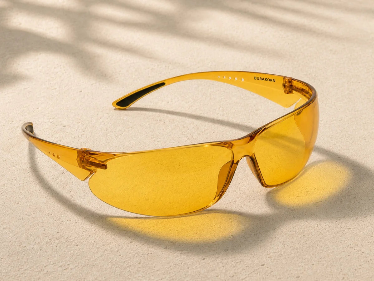 B-Lumin 72 amber eyewear in daylight on warm stone
